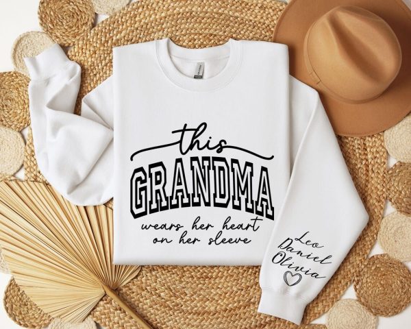 Custom This Grandma Wears Her Heart On Her Sleeve Sweatshirt Shirt with Names On Sleeve Mommy Heart Hoodie Mothers Day Gift 1