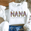 Custom This Mama Wears Her Heart On Her Sleeve Sweatshirt Personalized Mom Sweatshirt With Kids Names Grandma Shirt with Names On Sleeve 1