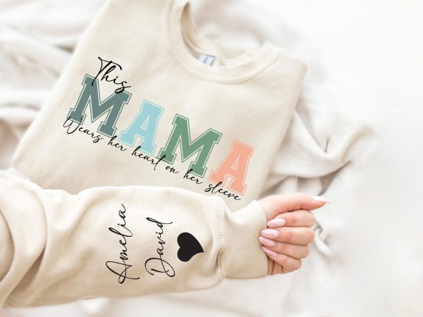 Personalized This Mama Wears Her Heart On Her Sleeve Hoodie Personalized Mom Sweatshirt With Kids Names Cute Momma Mothers Day Gifts 2