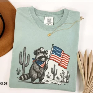 Patriotic Raccoon 4th of July  T-Shirt – Funny USA Flag Cowboy Animal Tee, Vintage Western Independence Day T-Shirt