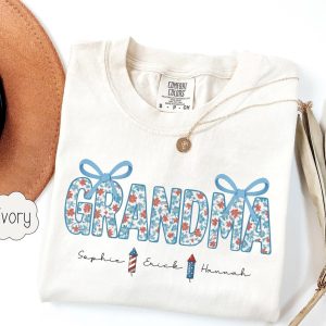 Personalized Grandma T-Shirt, Custom Patriotic Nana 4th Of July Mimi Grandkid Name Shirt, Floral USA Shirt, Coquette USA Shirt, Fourth Of July