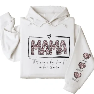 This Mama Wears Her Heart on Her Sleeve Hoodie – Custom Hoodie with Kids’ Names, Personalized Mother’s Day Gift for Mom