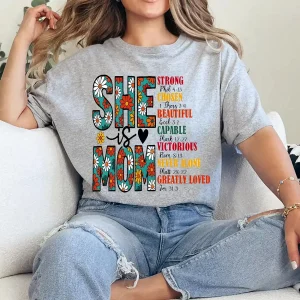 She Is Mom T-Shirt – Retro Christian Mom Shirt with Bible Verse, Blessed Mama Graphic Tee, Faith-Based Mother's Day Gift for Women