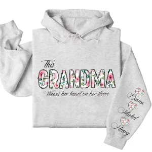This Grandma Wears Her Heart on Her Sleeve Hoodie – Custom Hoodie with Kids’ Names, Personalized Mother’s Day Gift for Grandma