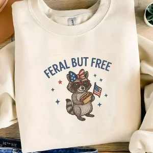 Feral But Free Raccoon Sweatshirt – Funny Patriotic Animal Shirt, 4th of July Coquette Top, USA Hot Dog Meme Gift