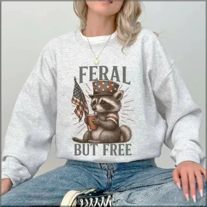Feral But Free Raccoon Sweatshirt – Funny Patriotic 4th of July Shirt, USA Freedom Animal Pullover, Retro America Party Sweater, Unisex Gift