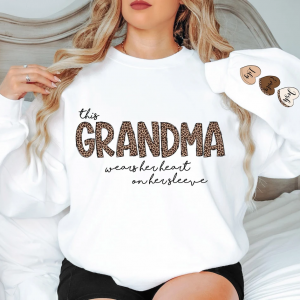 Personalized This Grandma Wears Her Heart on Her Sleeve Sweatshirt, Custom Kids Name on Sleeve, Mothers Day Gift, Gift for Grandma Sweatshirt